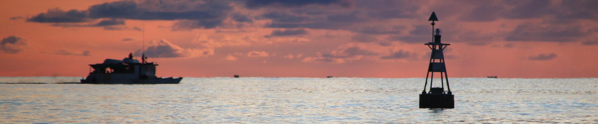 IFAN maritime activities buoy and boat